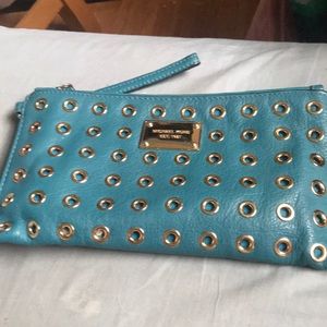 Great used condition MK teal large wristlet!